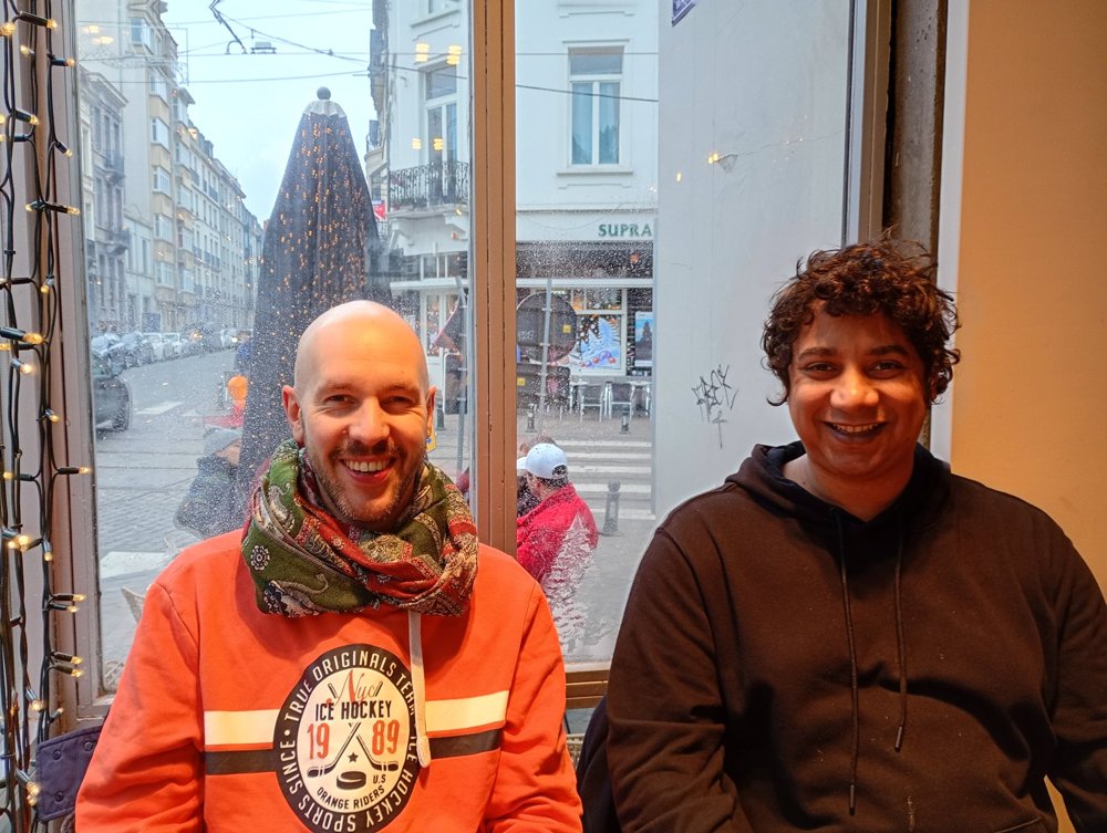 THE Librarian (right) with his friend JC (blurred) at a caf&eacute; window in Brussels, December 2025